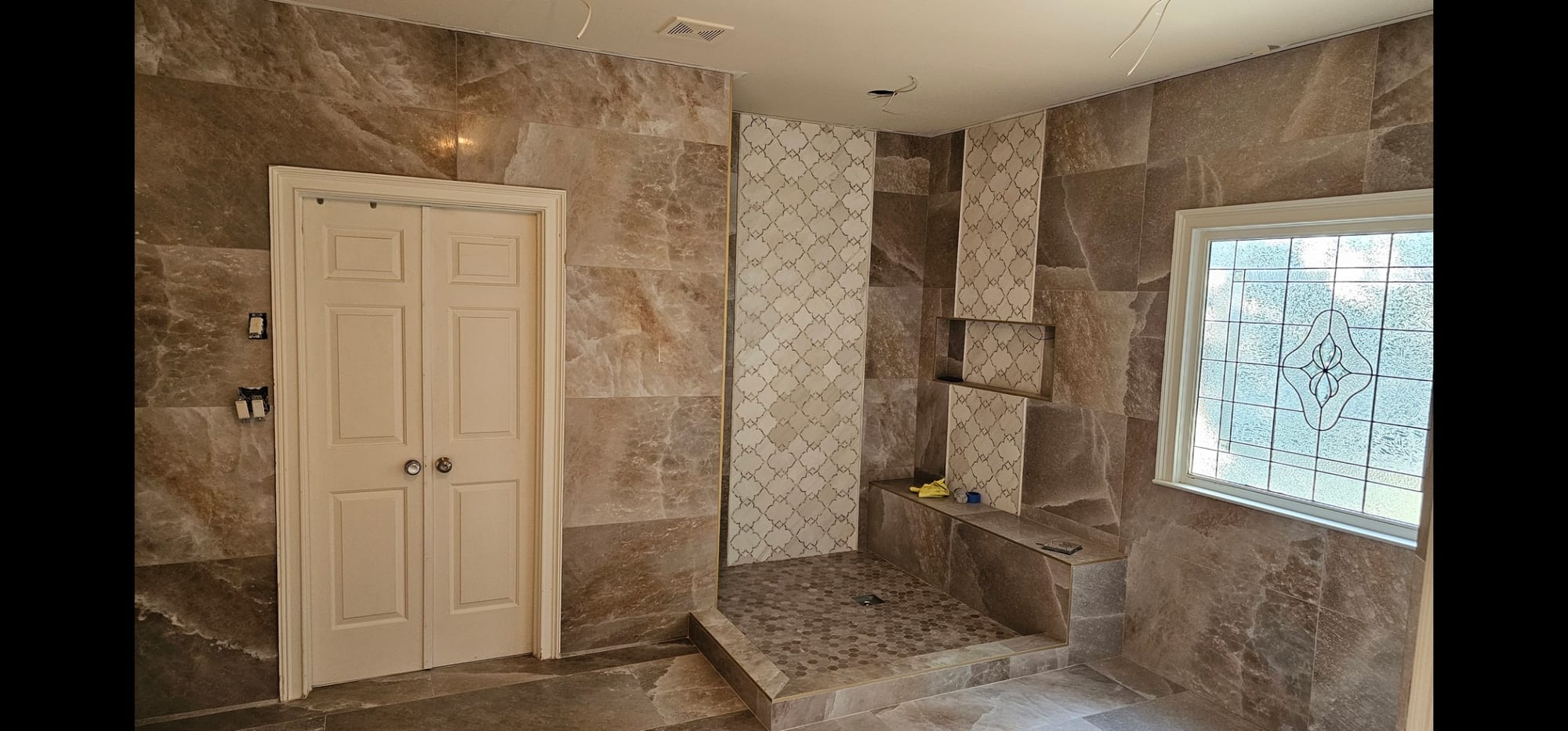 Bathroom with arabesque tile shower